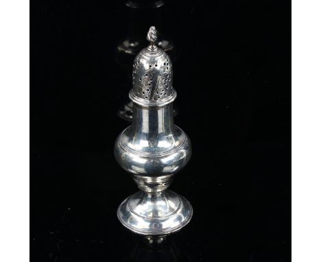 A George III silver baluster pepperette, with engraved foliate decoration and spiral finial, hallmarks London 1783, height 13