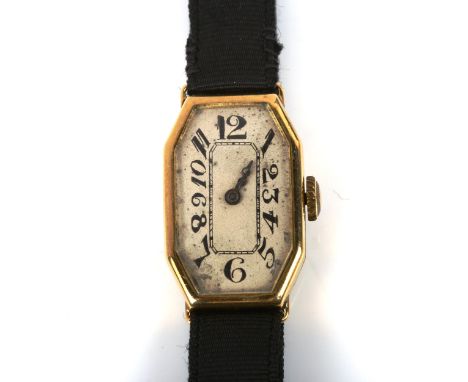 BUREN - a lady's Art Deco 18ct gold mechanical wristwatch, circa 1927, oval silvered dial with hand painted black Arabic nume