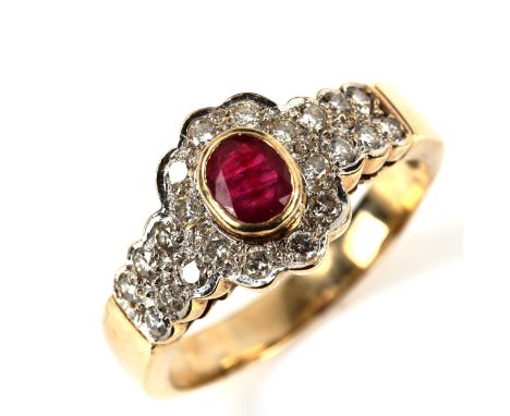 A large 9ct gold ruby and diamond cluster ring, set with oval mixed-cut ruby and modern round brilliant-cut diamonds, total d