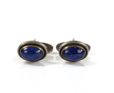 GEORG JENSEN - a pair of Danish silver and lapis lazuli cufflinks, model no. 44, panel length 17mm, 11.4gNo damage or repairs