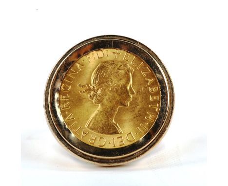 An Elizabeth II 1958 gold full sovereign coin, in 9ct gold ring mount, size X, 16.3g 