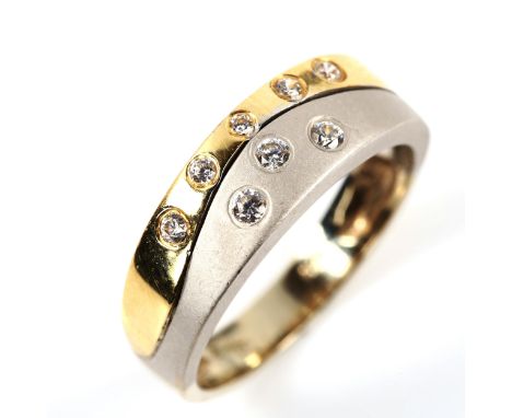 A 14ct two-colour gold diamond band ring, set with modern round brilliant-cut diamonds, setting height 6.6mm, size P, 5.2gNo 