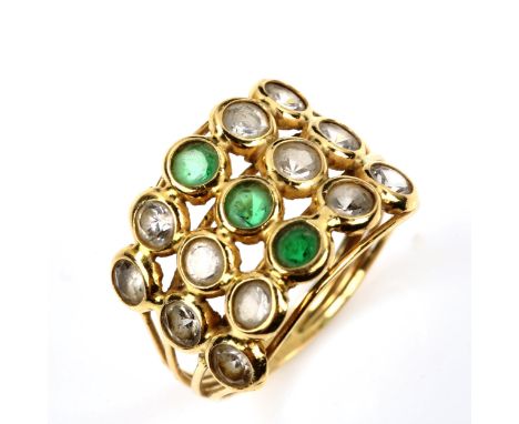 A Continental unmarked gold stone set ring, setting height 14.5mm, size R, 3.9gNo damage or repairs, all stones present, ring