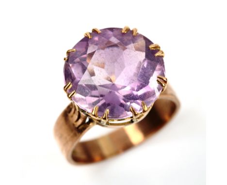 A large 9ct rose gold amethyst dress ring, setting height 16mm, size P, 5.9gNo damage, amethyst has rubbed and abraded facet 