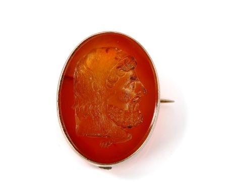 An Antique carnelian seal fob brooch, intaglio carved with male head profile, in unmarked gold frame, brooch height 26.6mm, 5