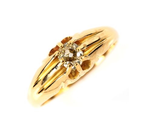 An 18ct gold 0.4ct solitaire yellow diamond gypsy ring, claw-set with old-cut diamond, diamond weight calculated from measure