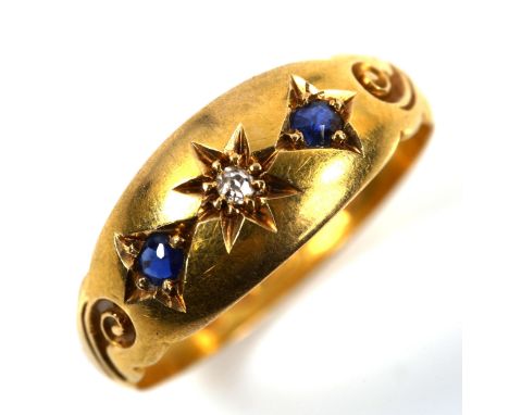 A Victorian 18ct gold three stone sapphire and diamond ring, set with old-cut diamond and oval-cut sapphire, hallmarks Cheste