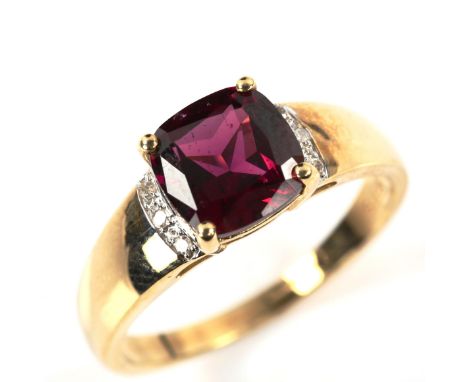 A modern 9ct gold rhodolite garnet and diamond dress ring, setting height 8mm, size R, 3.3gNo damage or repairs, all stones p