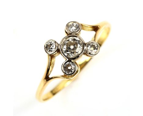 An early 20th century 18ct gold five stone diamond cross ring, set with round old-cut diamonds, total diamond content approx 