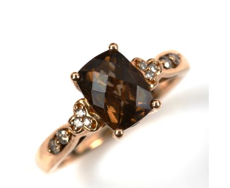 A modern 14ct rose gold smoky quartz and diamond ring, setting height 8.5mm, size K, 3.2gNo damage or repairs, all stones pre