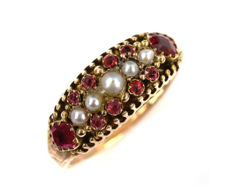 A Victorian 15ct gold ruby and pearl half hoop ring, foliate engraved shoulders with closed-back settings, hallmarks Birmingh