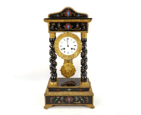 A 19th century French brass-mounted ebonised 4-pillar portico 8-day mantel clock, white enamel dial with Roman numeral hour m