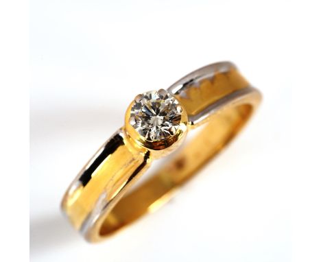 A modern 18ct gold 0.51ct solitaire diamond ring, set with modern round brilliant-cut diamond and 2-colour gold shoulders, co