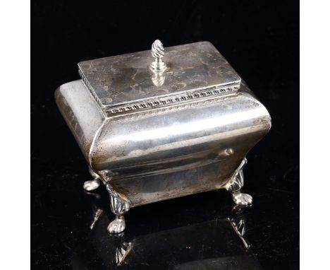 An Edwardian silver sarcophagus tea caddy, spiral finial with gadrooned rim and lion paw feet, by Elkington & Co, hallmarks L