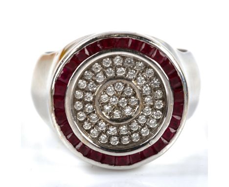 A large modern 18ct white gold ruby and diamond cluster target ring, set with calibre-cut rubies and modern round brilliant-c