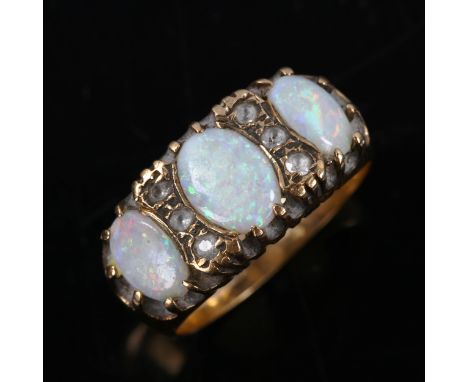 A 9ct gold seven stone opal and paste half hoop ring, setting height 9.7mm, size O, 4.6gNo damage, all stones present, all ar