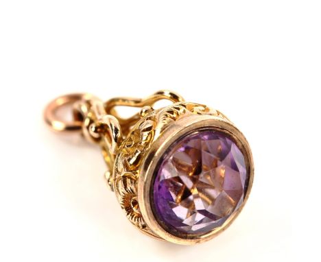 A small 9ct rose gold amethyst fob pendant, with relief embossed foliate decoration, amethyst diameter 10.4mm, fob height exc