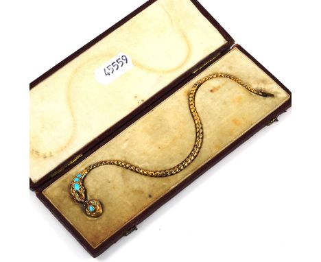 A fine Victorian gold gem set snake/serpent bracelet, the relief embossed and chased foliate head set with cabochon turquoise