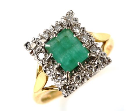 An 18ct gold emerald and diamond rectangular cluster ring, set with emerald step-cut emerald and round brilliant-cut diamonds