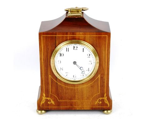 An Art Nouveau French satinwood-inlaid rosewood mantel clock, white enamel dial with Arabic numerals and brass bun feet with 
