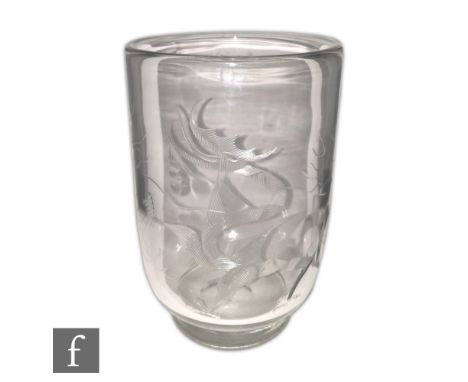 Steuben - A large 1930s Art Deco clear crystal vase of footed cylindrical form engraved decorated with a stylised dragon afte