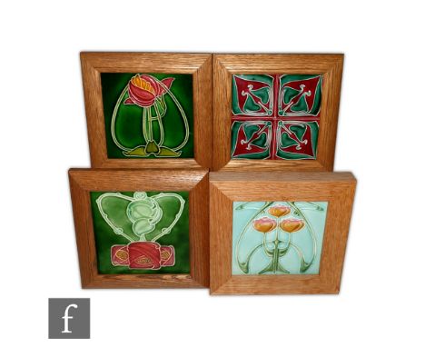 Unknown - Three framed Art Nouveau 6in dust pressed tiles each decorated with a stylised floral design, together with four 3i