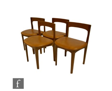 Nathan Furniture - A set of four teak rail back dining chairs, with brown vinyl upholstered seats above tapered legs, S/D. (4