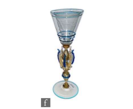 In the manner of Salviati - A large mid 20th Century Italian Murano pale amber glass goblet with a bell form bowl with applie