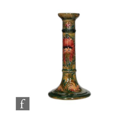 William Moorcroft - Revived Cornflower - A candlestick of Tuscan column form circa 1914, decorated with flowers and foliage a