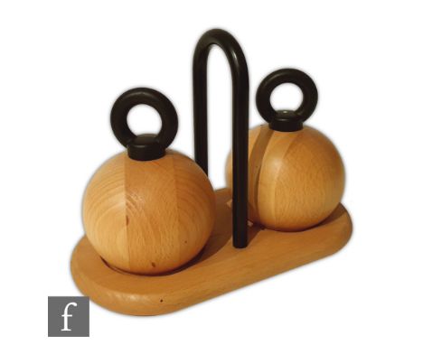 Bodum - A later 20th Century teak cruet set, the dumbell shaped salt and pepper designed by R. Nissen and the matching tray b