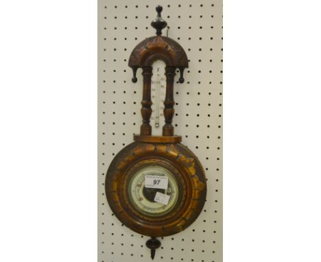 An early 20th century walnut wall barometer/thermometer