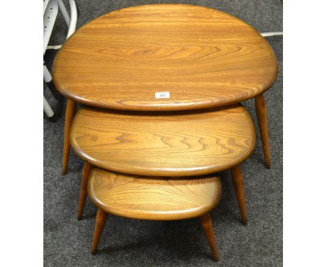 An Ercol nest of coffee tables