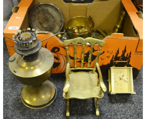 A novelty miniature brass chair; horse brasses, various; a brass desk stand; a George II brass candlestick; bronze jam pan; b
