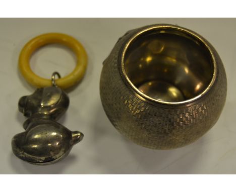 An Elizabeth II silver globular match strike, engine turned throughout, William Comyns & Sons Ltd, London 1967, 6oz gross; an