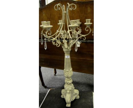 A floor standing chandelier, six branch, six light, with glass prisms