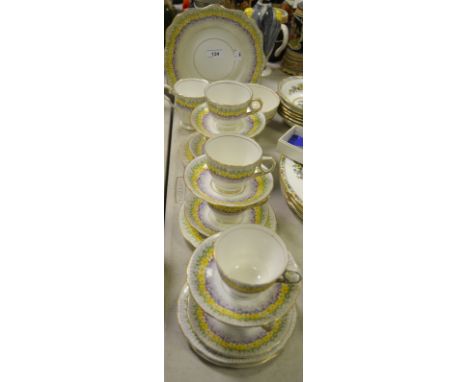 A Royal Stafford Glendale tea service, colourfully decorated with flowers, printed mark