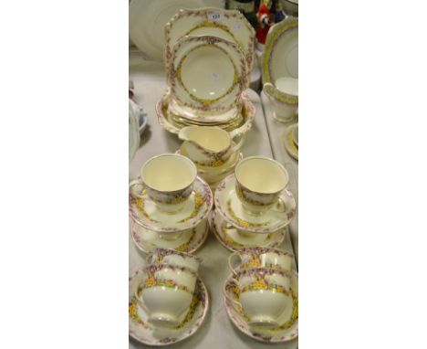 A Royal Winton May Bloom pattern breakfast service, comprising fruit serving bowl and fruit bowls, tea cups, saucers and tea 