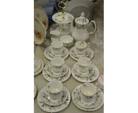 A Royal Albert Brigadoon pattern part coffee service, consisting of a cake stand, coffee pot, sugar bowl, cream jug, cups, sa