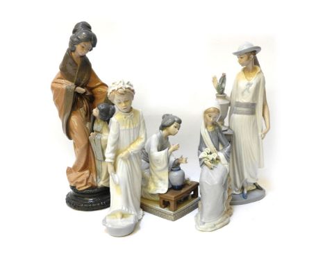 Three Lladro, and two Nao porcelain figures