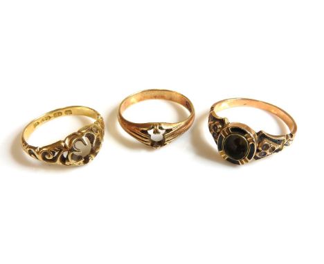 An 18ct gold single stone ring, (stone deficient), a gold enamel ring, tested as approximately 15ct, damaged, and a gold sing