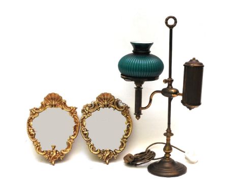 A student lamp (converted to electricity), and a pair of oval gilt metal mirrors