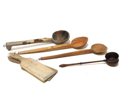 Treen items, including a pair of butter plates, three spoons and a turned wood ladle