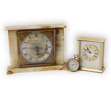 A pocket barometer, together with two mantle clocks