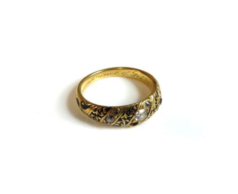 A Victorian gold memorial diamond and black enamel ring, with engraved inscription to band (one diamond deficient), with glaz