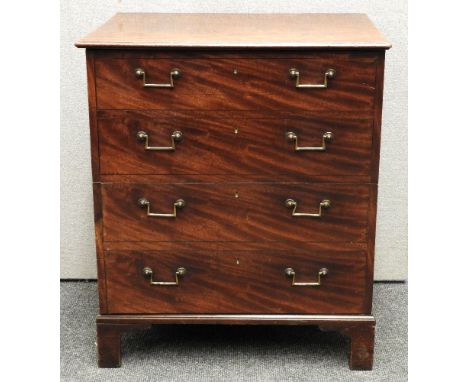A George III mahogany commode cupboard, the dummy drawer fronts with original handles
