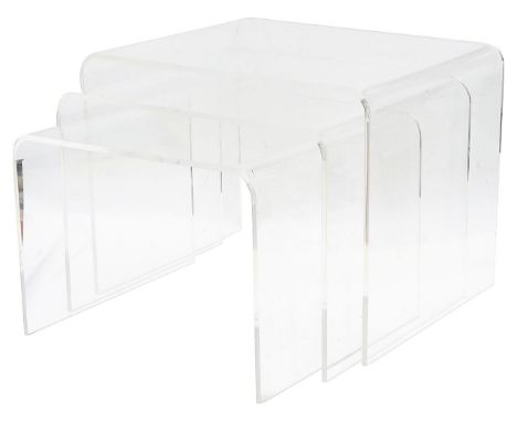 A nest of three clear acrylic graduates occasional tables (3)height 37.9 cm., width 50 cm., depth 38cm.Condition:Good conditi
