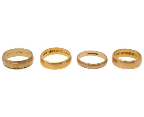 A collection of gold bandsincluding; two 22ct gold rings, stamped with hallmarks and two 9ct gold rings, stamped with hallmar
