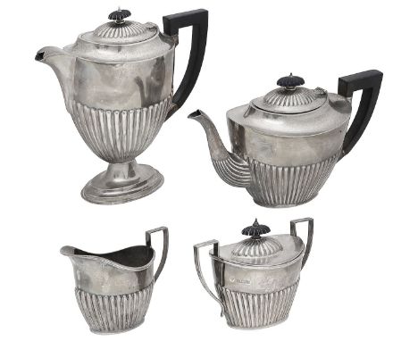 An Elizabeth II matched silver four piece tea and coffee servicecomprising coffee pot, twin handled sugar basin and cover and