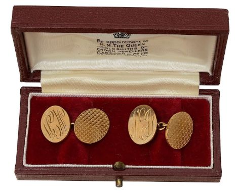 A pair of 9ct gold oval cufflinkschased with initials and engine turned design, with chain backs, stamped with London hallmar