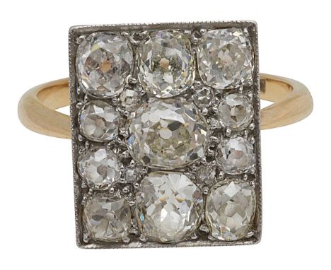 A diamond-set panel ringthe rectangular plaque set with eleven old brilliant-cut diamonds to the plain tapering shank stamped